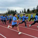 Joyful runners on the school track during the fun run on Nov. 8.