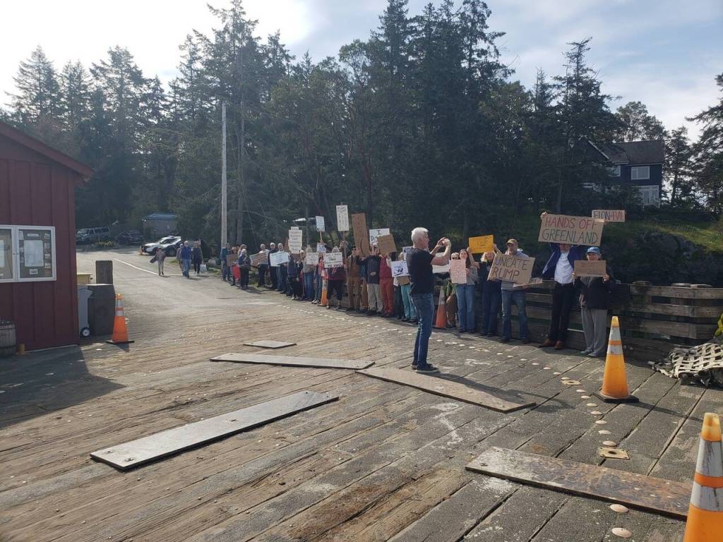 Locals engage in the Hands Off protest. Contributed photo.