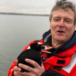 Bob Friel about to release a surf scoter.