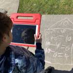 Aiden Parkerson posting a photo of his outdoor math practice and describing it to his parents.