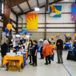 Members interacting with OPALCO and vendor booths. Contributed photo.