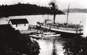 The Orcas ferry terminal in the early part of the 20th century when transportation was via a steamer boat. WSF began operating in 1951.