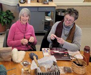 Annette and Andrea in the needlework circle.