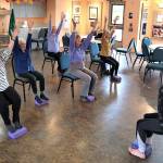 Contributed photo.
Participants engage in chair yoga.