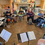 Contributed photo. Participants engage in a ukulele circle.