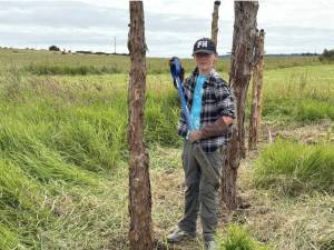 Mike Rosekrans photo.
Nolan Wall, along with other Youth Conservation Corps crew members from San Juan, was pictured working on building a beaver dam analog to slow stream flow and restoring wetlands at Zylstra Lake.