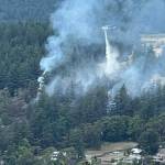 Tony Simpson photo.
A DNR helicopter fighting the wildland fire in West Sound.