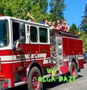 Contributed photo.
Olga Daze members wave from a fire truck.