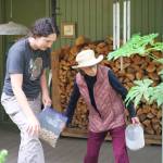 Darrell Kirk photo.
Cynthia Frausto and Jean Henigson place nuts to attract varying squirrel species.