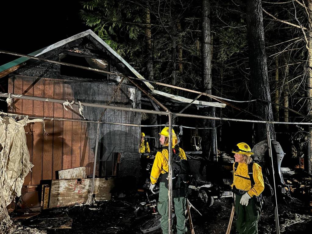Monico Mackinnon photo.
Firefighters at the scene of the fire.