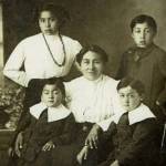 Mary French and her 4 youngest. Left top Vela, left bottom Cornelius (Josiah Frenchs great grandfather), top right John, bottom right Charlie French.
