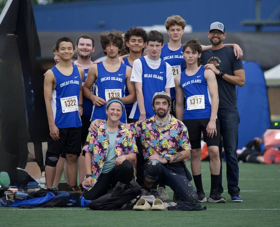 Corey Wiscomb photo.
Back row, left to right: Max Peterson, Tom Malo, Drew Nunez and volunteer coach Matthew Tong, Kai Park, Kai Gilliam, Hugh Kirk, Gabe Chapman. Front row: Head coach Sarah Gully and assistant coach Christopher Barry.