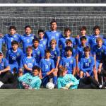 Corey Wiscomb photo.
Back row, left to right: Javier Puente Goana, Ziah Nash Watson, Diego Puente, Sam Vaccarella, Kevin Perez Torres, Angelo Vaccarella, Joaquin Shanks Morales, Hayes Richardson, Amaru Shanks Morales, Anthony Conejo, Lauro Quintero-Carrion, Zane Pechacek, Daniel Segault. Third row: Gus Carpenter, Jason Rodriguez Jaurequi, Justin Valazquez, Diego Cruz Gonzales, Drew Bond, Jack Marl, Junior Conejo Medina, Owen Carlson, Elijah Griffith, Andre Kasperski. Second Row: Coach Terry Turner, Avery Van Arsdale, Andy Meraz, Jaden Rodriguez, Golden Raymer, Coach Sid Hayworth. Front row: Tim Malow, Eli Orleman.