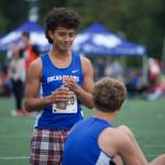 Darrell Kirk photo.
Teammates rest on the sidelines.