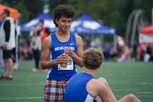Darrell Kirk photo.
Teammates rest on the sidelines.