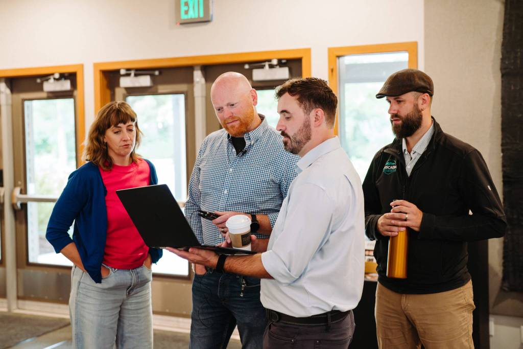 Krista Bouchey (OPALCO), Russell Guerry (OPALCO), Callum McSherry (Cascadia Renewables).