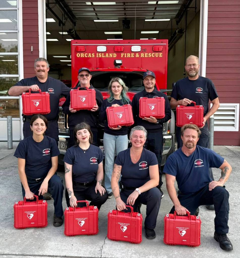 Contributed photo.
New Orcas Fire and Rescue EMTs with their new AEDs.