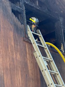 Contributed photo.
Firefighters work to contain the fire.