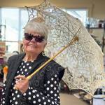 Contributed photo.
Senior DD Glaze enjoying services with her parasol.