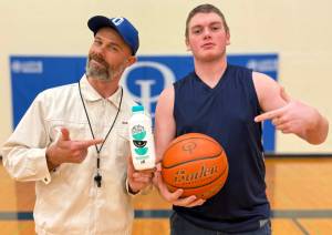 Contributed photo.
Teacher and basketball coach Corey Wiscomb and student Jaxon Paulsen.