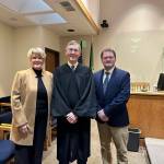 Kari McVeigh, Judge Alan Hancock and Justin Paulsen.