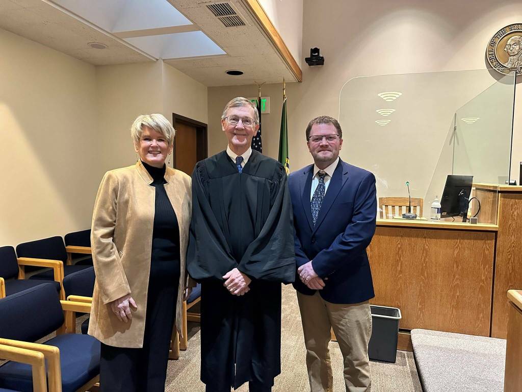 Kari McVeigh, Judge Alan Hancock and Justin Paulsen.