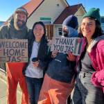 Contributed photo.
Jasmine Ikeda (second from left) was welcomed off the ferry to Orcas Island on Oct. 13 by a crowd of cheering, teary supporters.
