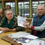 Darrell Kirk Staff photo
George Lamb holds up solar research.