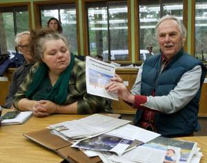 Darrell Kirk Staff photo
George Lamb holds up solar research.