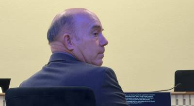 Cassie Diamond photo. Sen. Keith Wagoner, R-Sedro Woolley, listens to the staff report for SB 5268 during a public hearing Feb. 18.