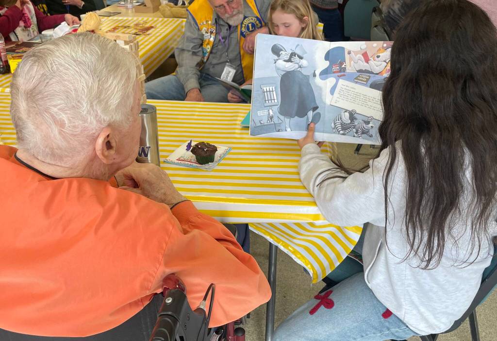 Orcas Christian students share stories, laughter with seniors in reading program