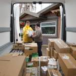 Darrell Kirk photo.
Burke Mulvaney and a helper loading up his delivery truck.