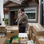 Darrell Kirk photo.
Burke Mulvaney takes stock of his delivery truck.