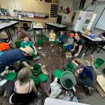 Contributed photo.
San Juan Island 4-H Youth assemble composting worm bins.