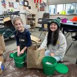 Contributed photo.
Local 4-H members Sierra Miller (Orcas) and Skylar Capps (Lopez) assemble their worm bins.