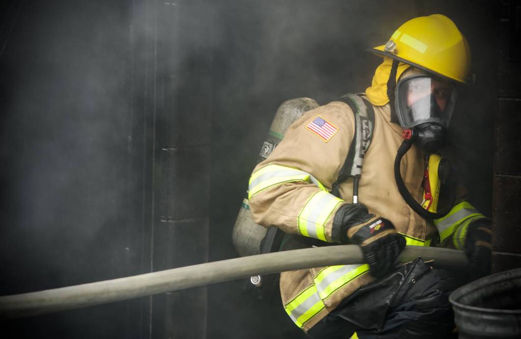 Hose management on air in a burning building.