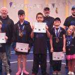 Contributed photo.
End-of-the-year banquet (l to r): Front row: Elliot Wooding, Weston Wooding, David Nuñez, Caden Mcguire-King, Nora Wooding and Mariana Nuñez. Back row: Coaches Rob Kirby, Jason Dean and Rob Harvey.