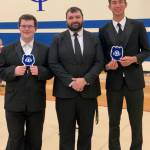 Darren Dix (center) with graduating band seniors Max Peterson (left) and Angelo Vaccarella (right).