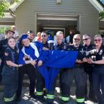Darrell Kirk photo.
Graduate Kairam Bailey is celebrated by his fellow Orcas Fire and Rescue volunteers.