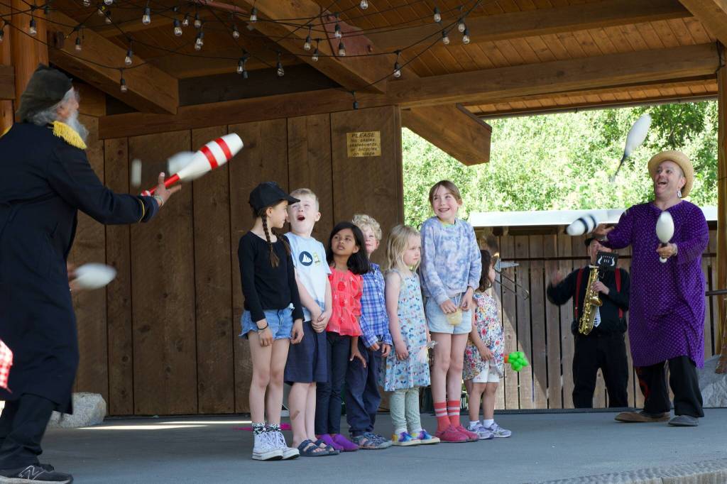 Darrell Kirk photo.
Paul Magid, far left, and Fable the Clown, far right, at the 2026 Orcas Island Solstice Parade.